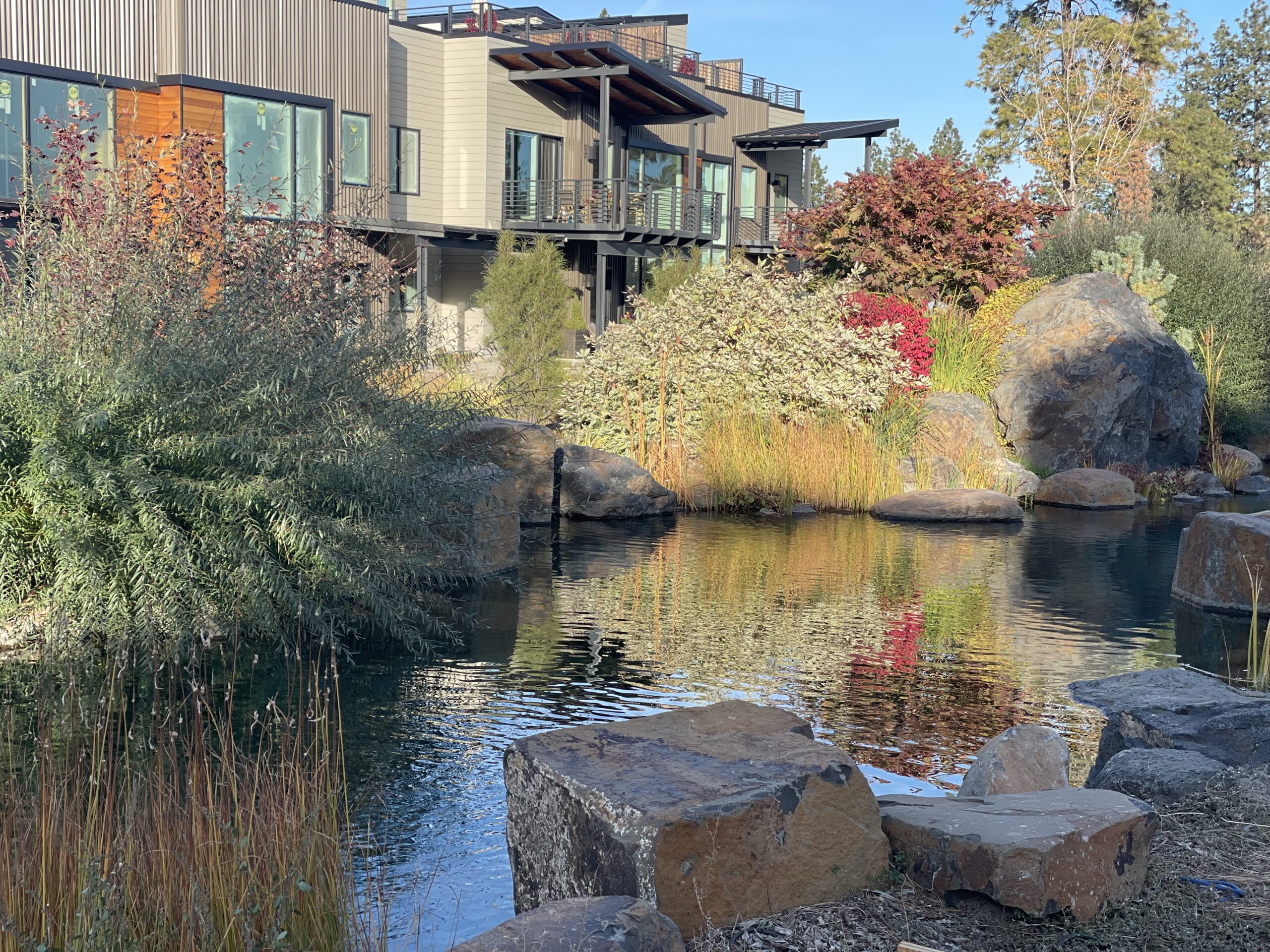 Homeowners enjoy the ponds that wind through Bella Terra's central garden.